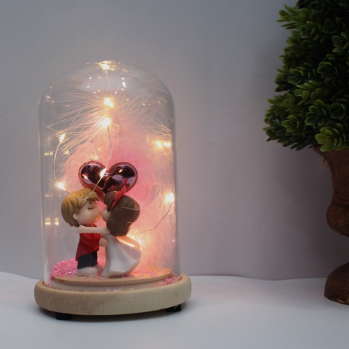 Cute Lovers Together In Dome With lights.