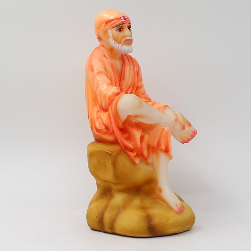 Sai Baba Sitting On Stone Statue Fiber Statue, Orange Sai baba, Medium Size 6 Inch